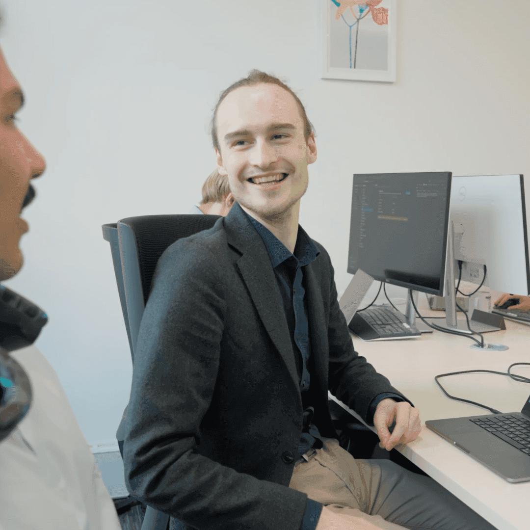 Team members collaborating with AI assistant